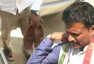 Karnataka minister Tukaram's aide carries his shoes