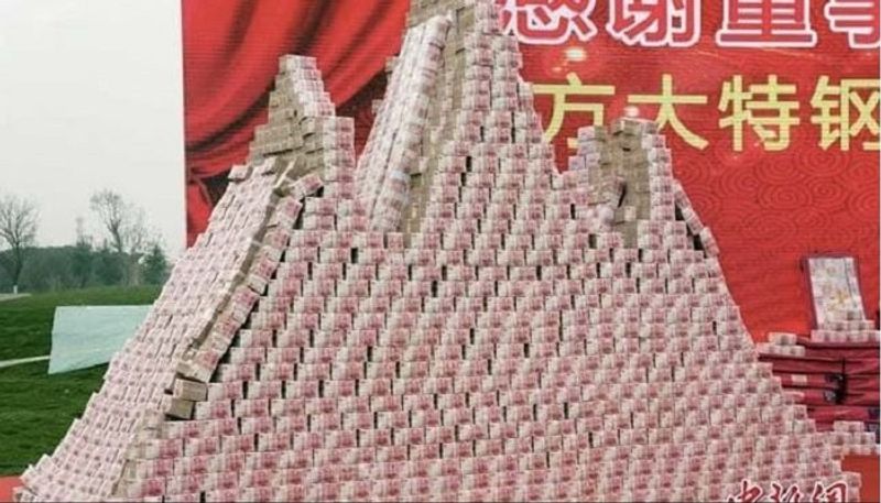 Chinese Company Builds 34 Crore Cash Mountain To Show Bonus