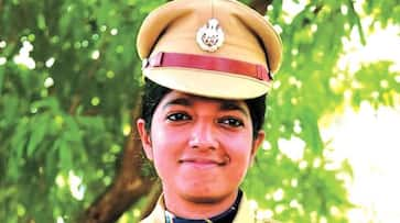 Woman IPS officer raid CPM district office transfer Kerala government Chaitra Teresa John