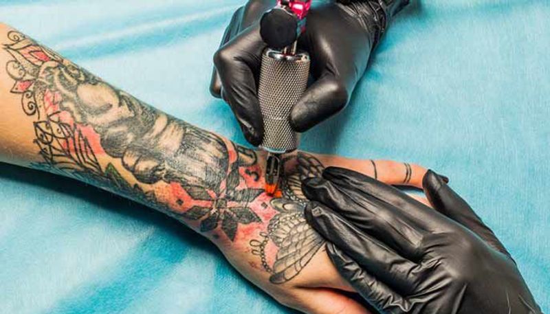 Us woman have tattoo entire her body, people call her demon akb