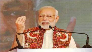 narendra Modi halted speech midway help fainted cameraman Surat gujarat