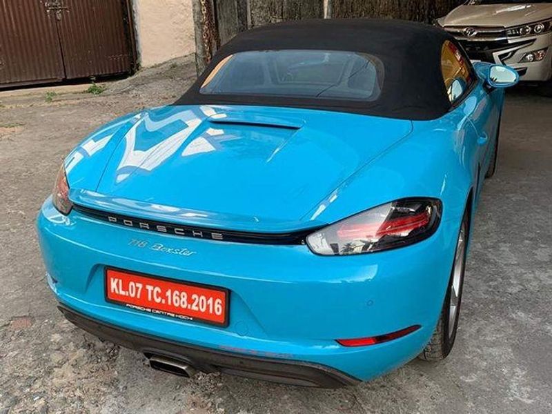 Kerala Business man paid RS 31 Lakh  for fancy number to his  Porsche 718 car