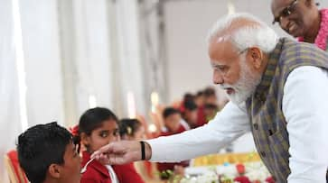 Prime Minister Narendra Modi serves three billionth Akshay Patra meal to poor school children in Vrindavan