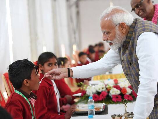 Prime Minister Narendra Modi serves three billionth Akshay Patra meal to poor school children in Vrindavan