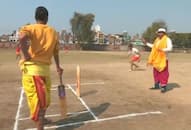 batting bowling fielding by wearing dhoti