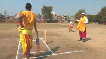 batting bowling fielding by wearing dhoti