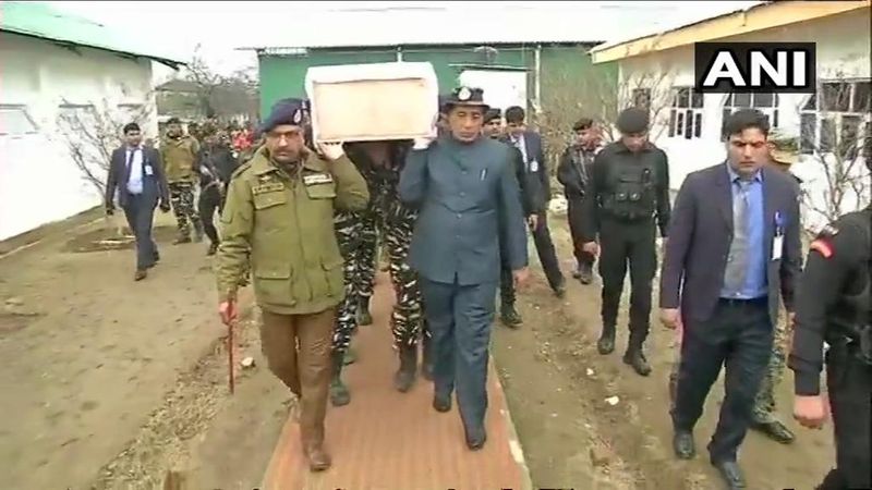 Home Minister Carries Coffin Of Soldier Killed In Pulwama Terror Attack