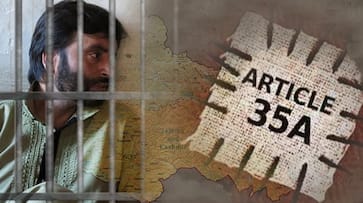 Article 35A repeal 100 companies paramilitary rushed Kashmir Yasin Malik