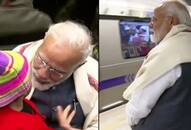 PM Modi takes metro ride ISKCON interacts commuters takes selfies