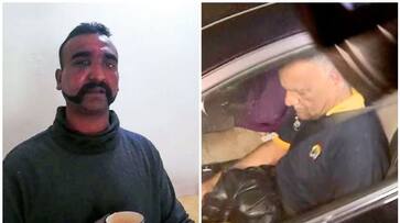 Wing commander abhinandan parents got standing ovation at delhi airport