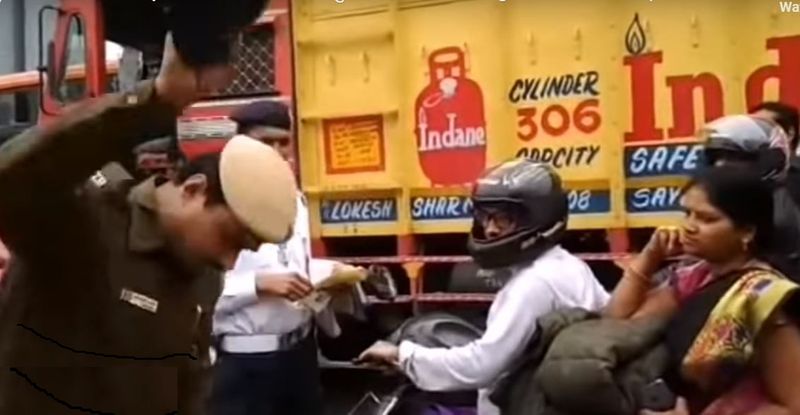 Delhi police surprise city riders break women helmet