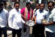 Chennai man files nomination carrying 3 buckets coins