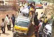 TDP candidate Thikka Reddy campaigns lying on stretcher