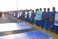 Over 3,000 people form human chain on Pamban Road Bridge, call for 100% voting