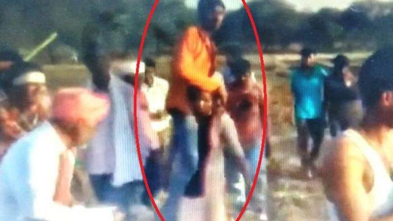 Madhya Pradesh Villagers force a woman to carry her husband on her shoulders as a punishment