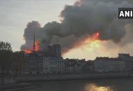 Notre-Dame Cathedral blaze: Parisians console each other amid talks of rebuilding