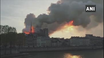 Notre-Dame Cathedral blaze: Parisians console each other amid talks of rebuilding