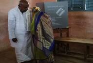 Karnataka: Actors, politicians visit  polling booths early on election day