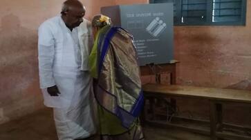 Karnataka: Actors, politicians visit  polling booths early on election day