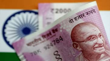 Rupee falls 17 paise against USD in early trade; Weak dollar, softening crude prices restricts drop