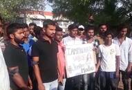 Raichur: Youths cast vote wearing black cloth, protest murder of engineering student