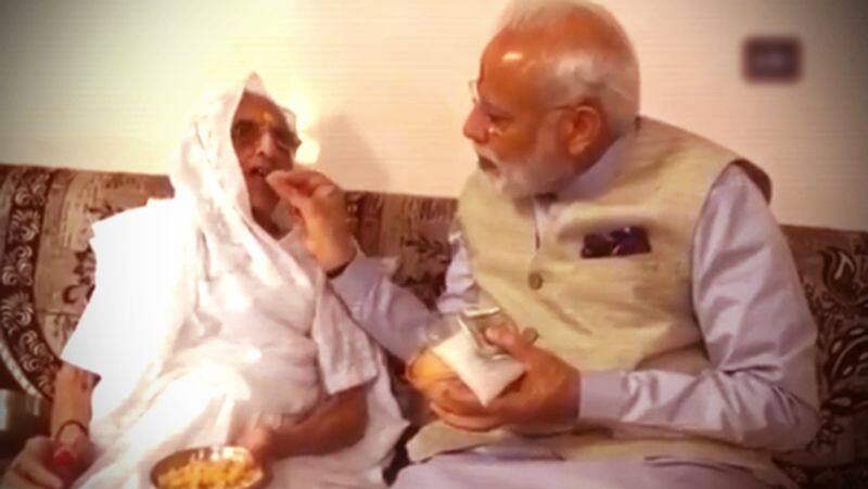 Modi with Mother Video..