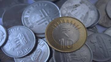 Rupee rises by 8 paise versus USD in early trade