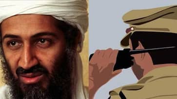 Osama Bin Laden appears car police take passengers into custody