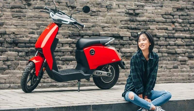 Ducati says an electric motorcycle is coming, but first they ve   announced this electric scooter