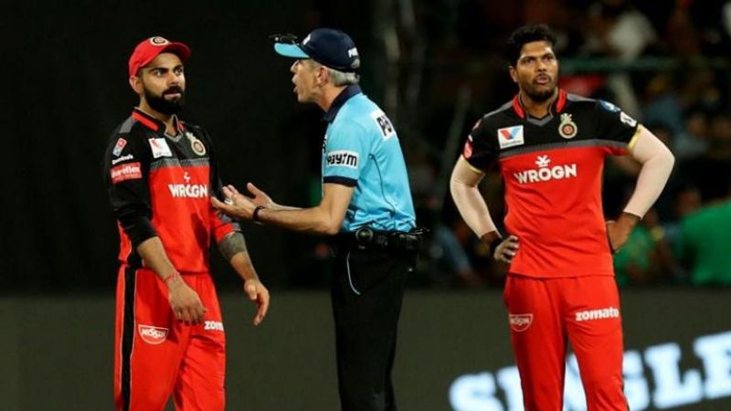 Umpire Nigel Llong kicks Umpire room door and fined rs 5k after RCB vs SRH match