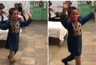 Afghan boy dances after receiving prosthetic leg