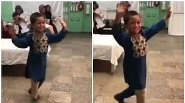 Afghan boy dances after receiving prosthetic leg