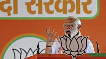 Pm modi slams bsp and samazwadi party and congress for fake promises in up election rally