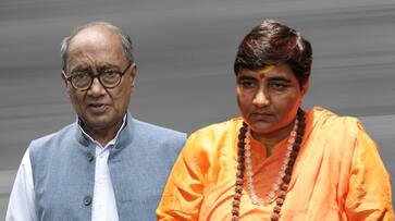 Digvijaya Singh and Sadhvi Pragya poll staff play antakshari while guarding EVM