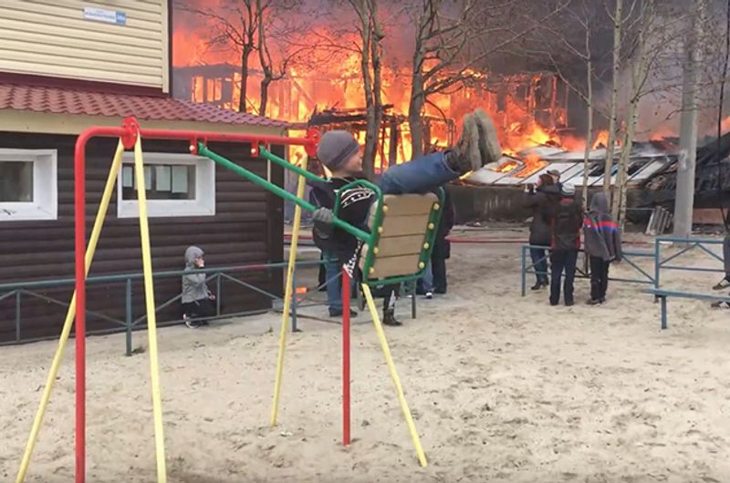 Boy Swings Near Raging Fire, video goes viral