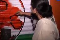 Mamata draws Trinamool symbol on office walls, claims it belonged to her