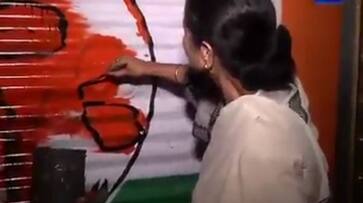 Mamata draws Trinamool symbol on office walls, claims it belonged to her