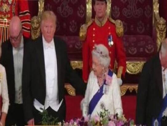 donald trump strikes controversy touches queen elizabeth and breaks protocol during england tour