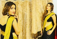 SAPNA CHOUDHARY PICTURES IN BLACK SAREE