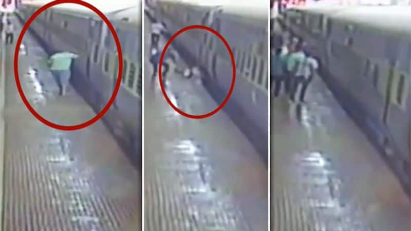 Man Fall in to train track video..