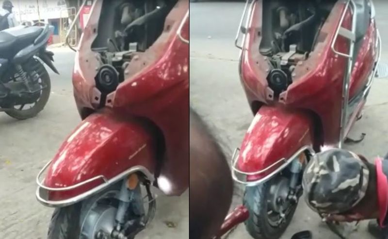 cobra found in a honda activa and rescued successfully at bengaluru