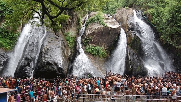 Tourists are allowed to bathe in the waterfalls at Courtalam after the rain subsides KAK