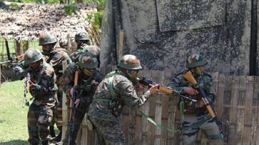 Exchange of firing underway between terrorists and security forces at Chadoora area of Budgam district