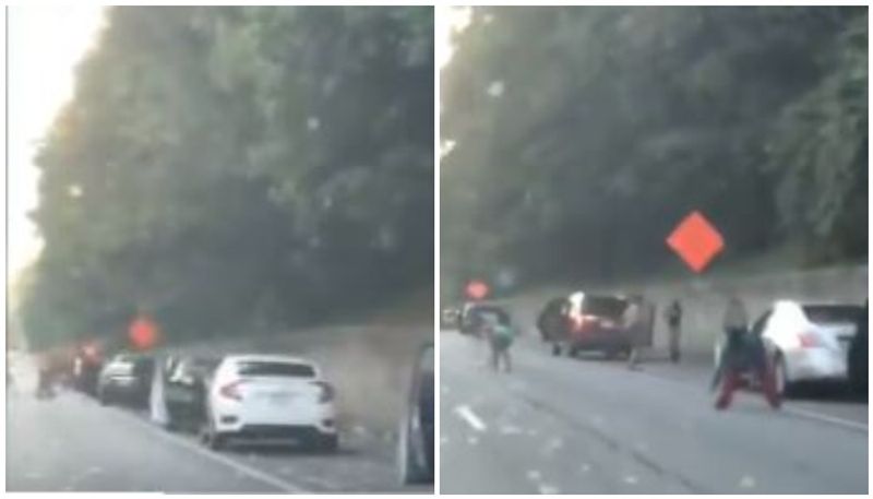 video of passengers collecting currency from road