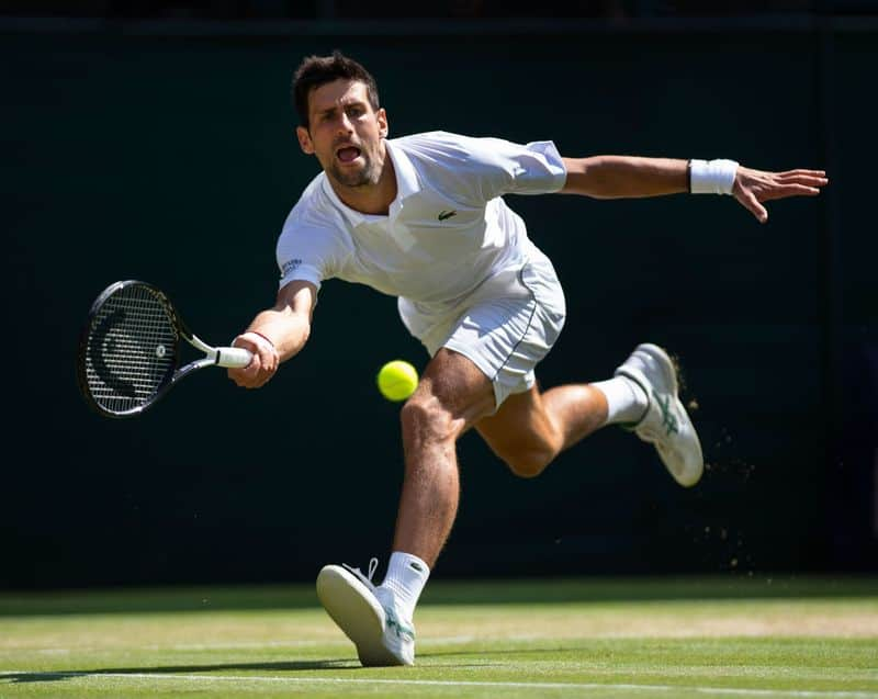 Wimbledon  Novak Djokovic advances to 2nd round with a unique record