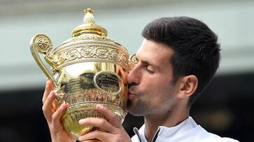 novak djokovic beats roger federer in longest Wimbledon final