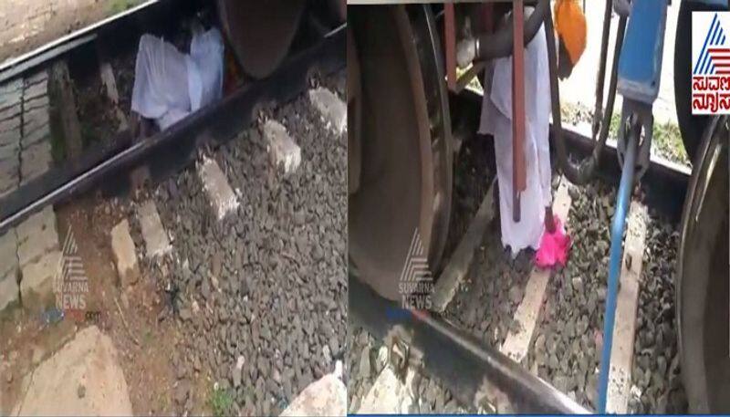 Old man survives train crash on rail track Bagalakote Video Viral