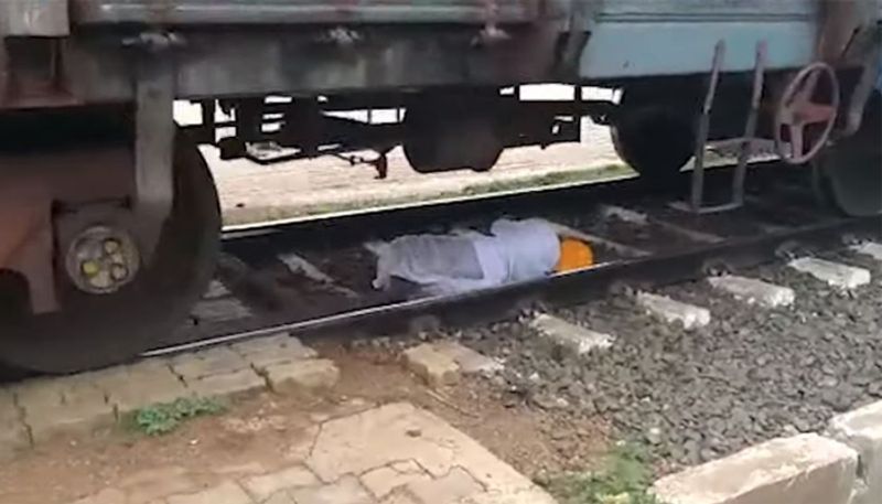 Old man comes under goods train escape unhurt in karnataka