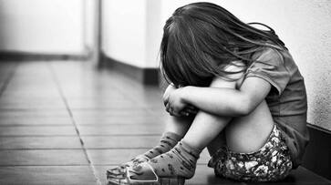 school girl  was raped by a middle aged man and she give birth to a dead baby in school premises