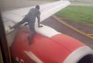 Nigeria Man attempts climb taxiing aircraft apprehended